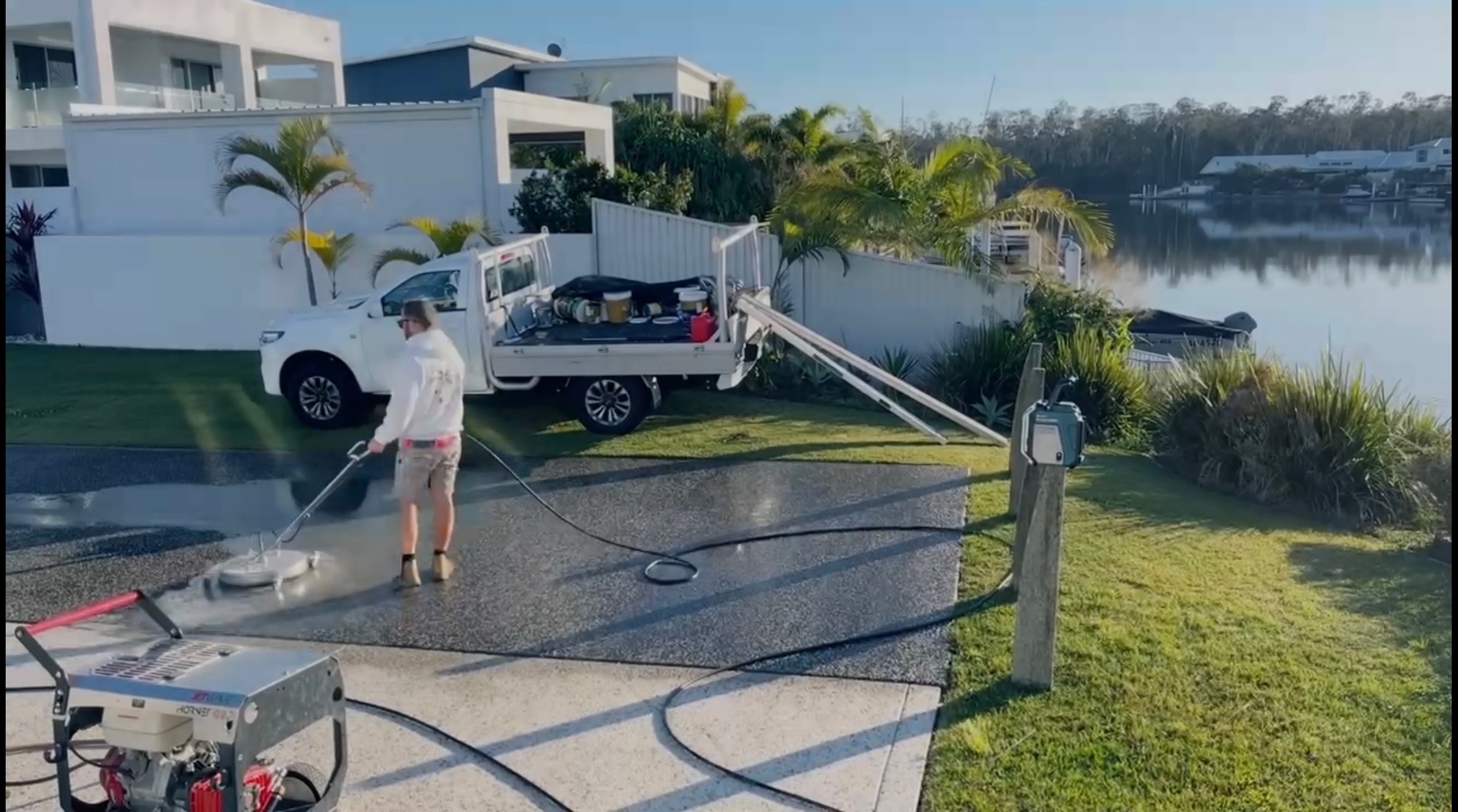 Pressure washing a concrete surface