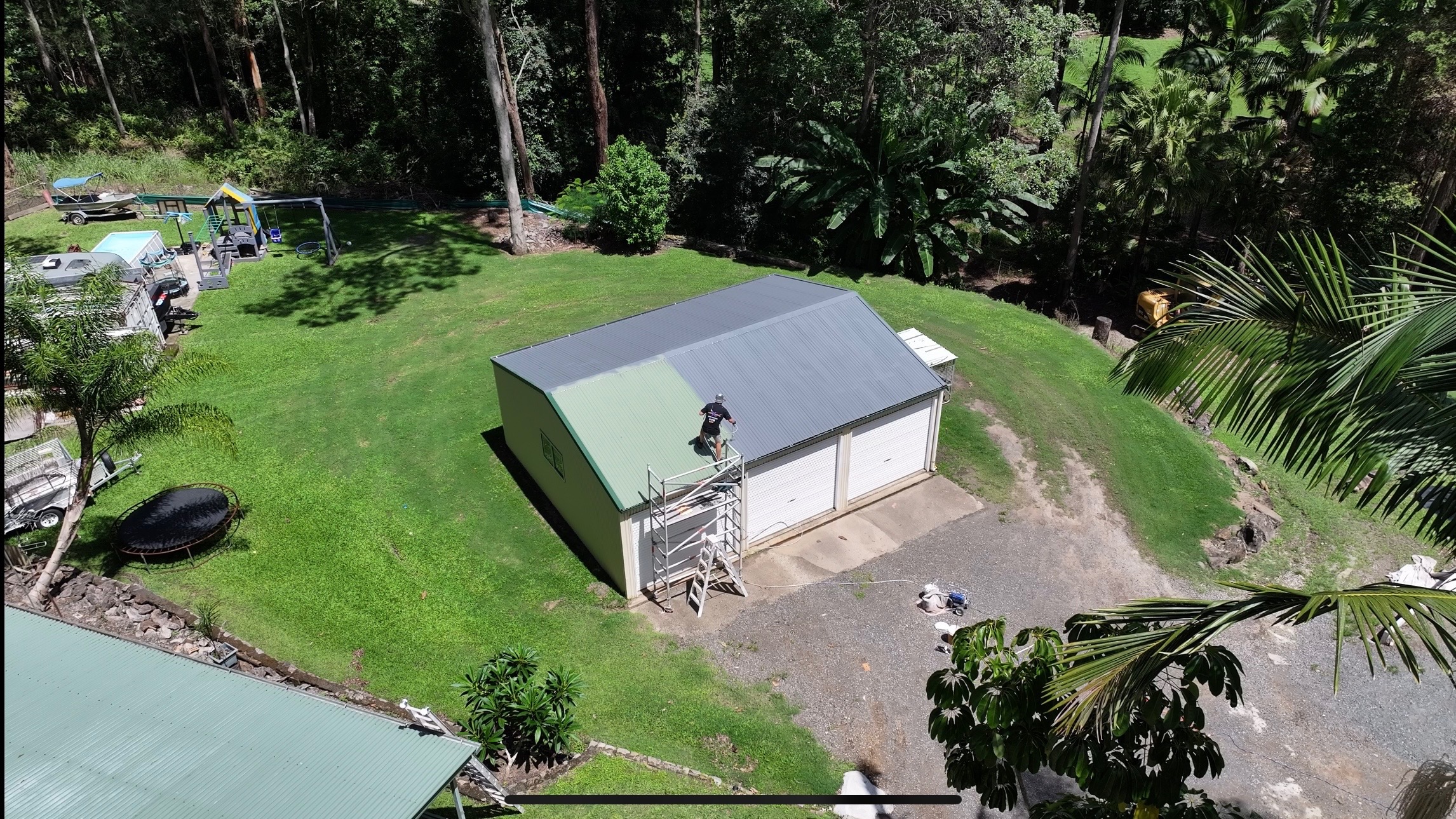 Roof being painted and sealed